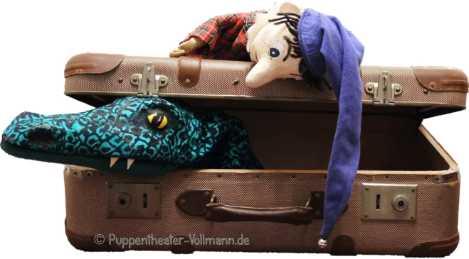(c) Puppentheater-Vollmann.de Kasper auf dem Koffer